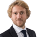 Portrait d’un client du secteur immobilier témoignant sur un projet n8n.